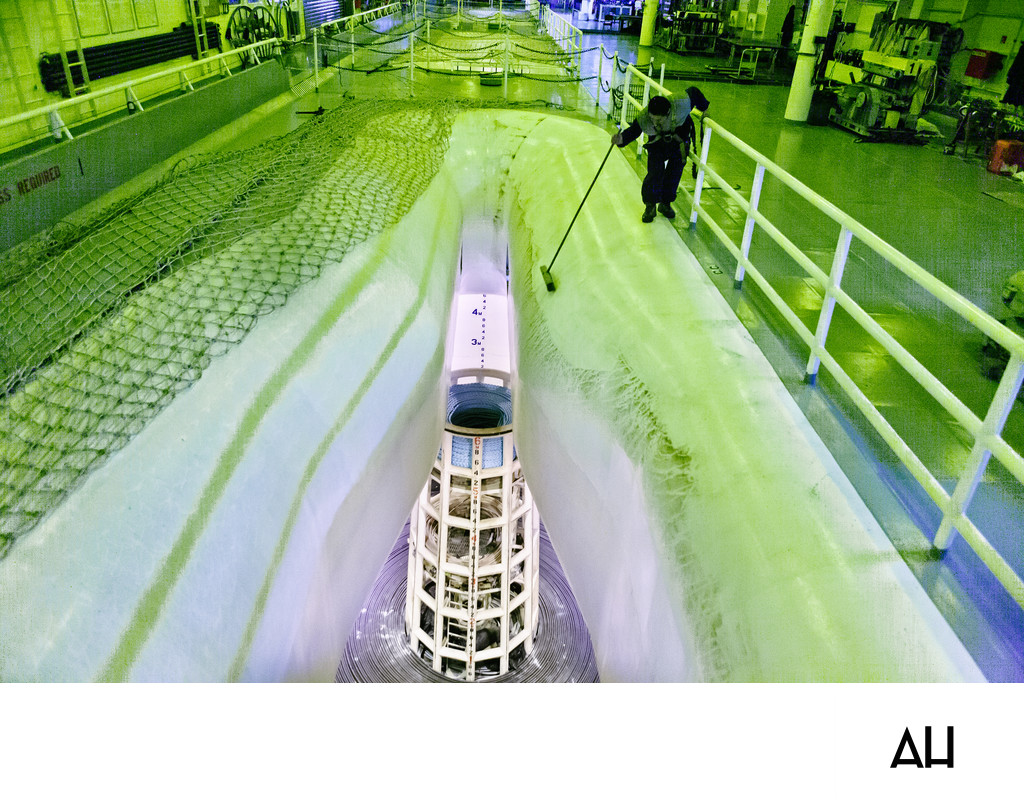 Technician Inspecting a Wind Turbine Blade Mold