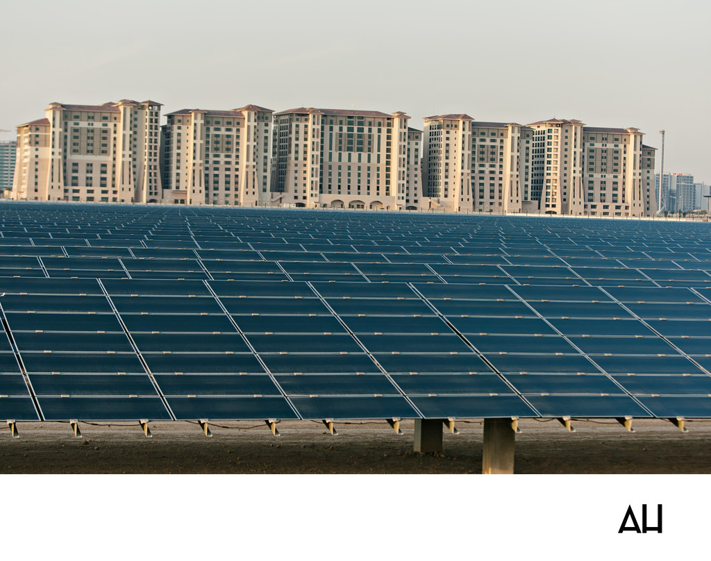 Large Solar Panel Field Beside Residential Towers