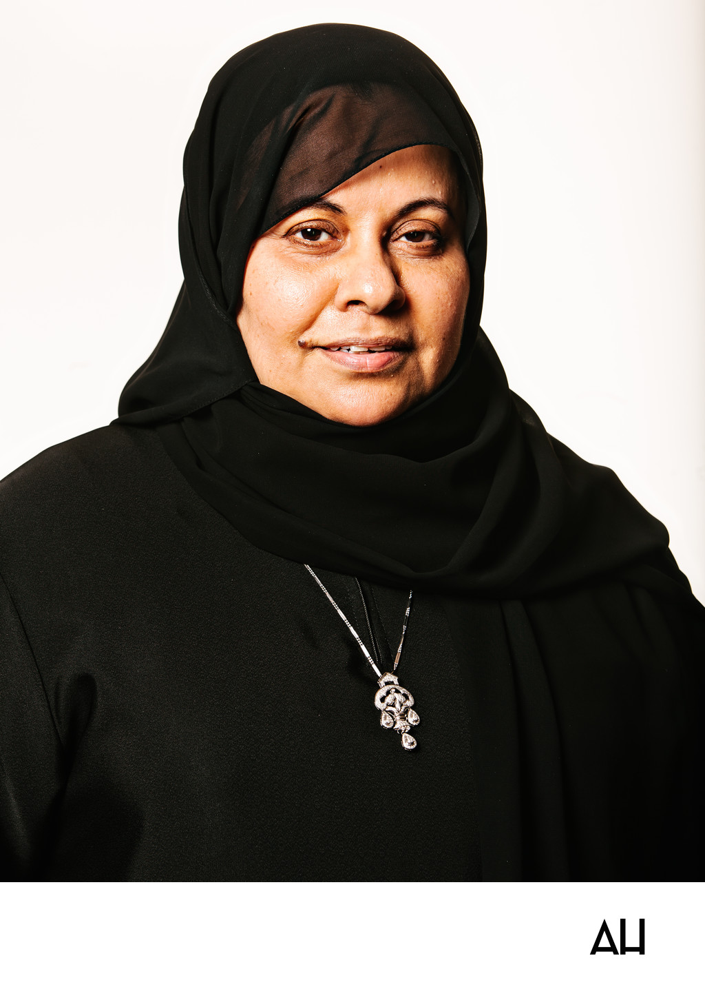 Studio Portrait of Woman in Black Hijab