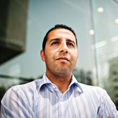 Businessman Outside Modern Office Building