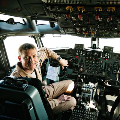 Military Pilot Inside an Aircraft Cockpit