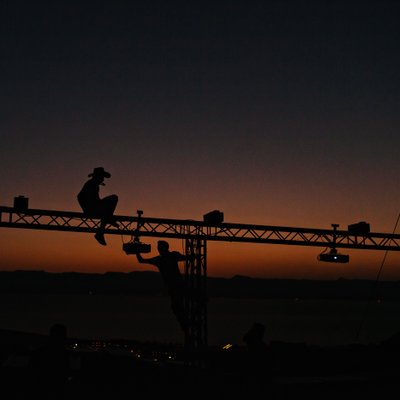 Rigging Technician Working at Sunset