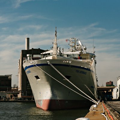 Cargo Ship Docked at an Industrial Port