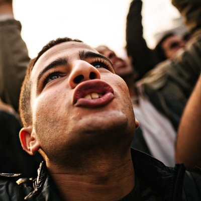 Young Protester Chanting in Cairo Crowd