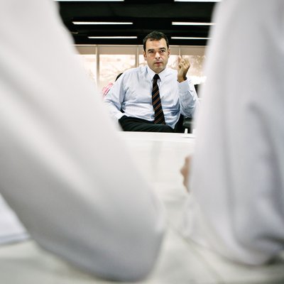 Business Leader Speaks During Office Meeting