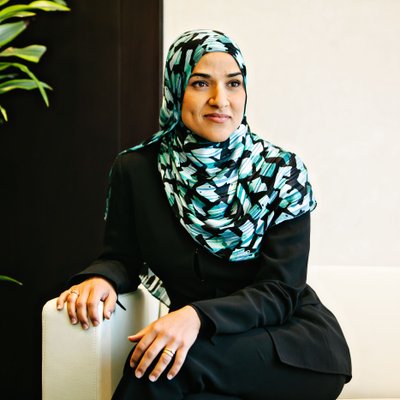 Professional Woman in Patterned Hijab