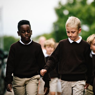 Elementary Students Walking Across Campus