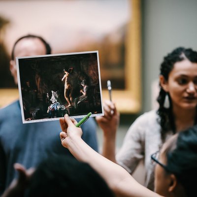Student Sharing Artwork During a Gallery Discussion