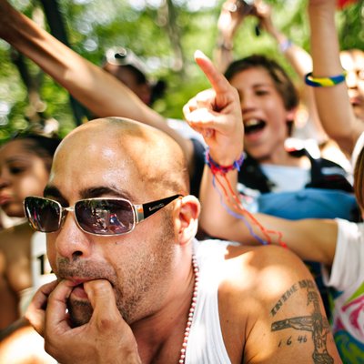Festival Crowd Cheers Along Parade Route