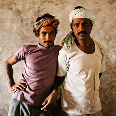 Portrait of Two Rice Mill Workers