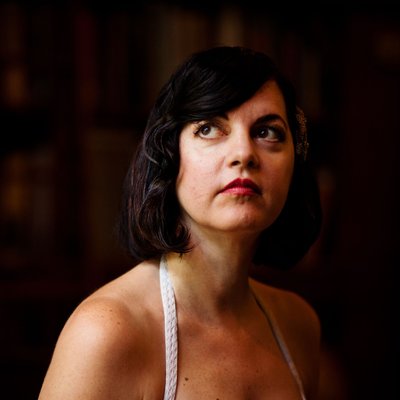 Thoughtful Woman in a Low-Light Portrait