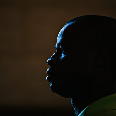 Dramatic Profile Portrait in Blue Light