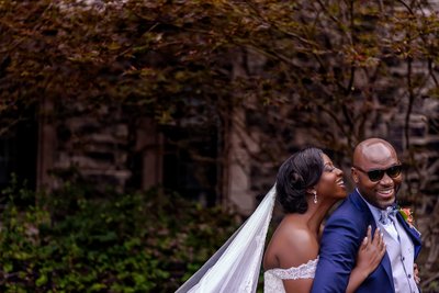 Black Bride and Groom Sharing an Intimate Moment During Po