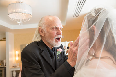 The bride's father seeing her for the first time
