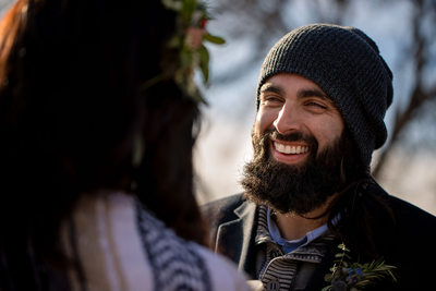 bearded groom with beanie 