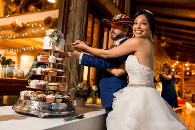 Blame Her Ranch Wedding cut cake