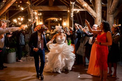 Colombian wedding hat masked bride sparkler exit