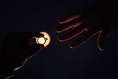 Wedding ring lit by moon proposal Albuquerque New Mexico