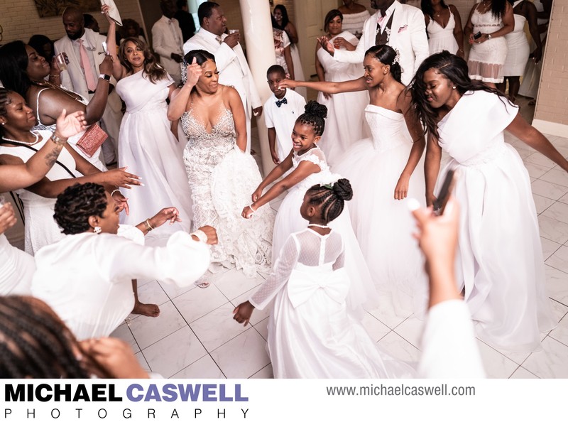 Bride dances with guests at Southern Oaks Reception