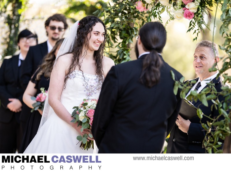 Bride Smiles During Henry Smith House Wedding Ceremony