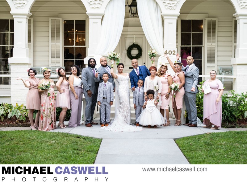 Group Wedding Photo in front of Maison Lafitte