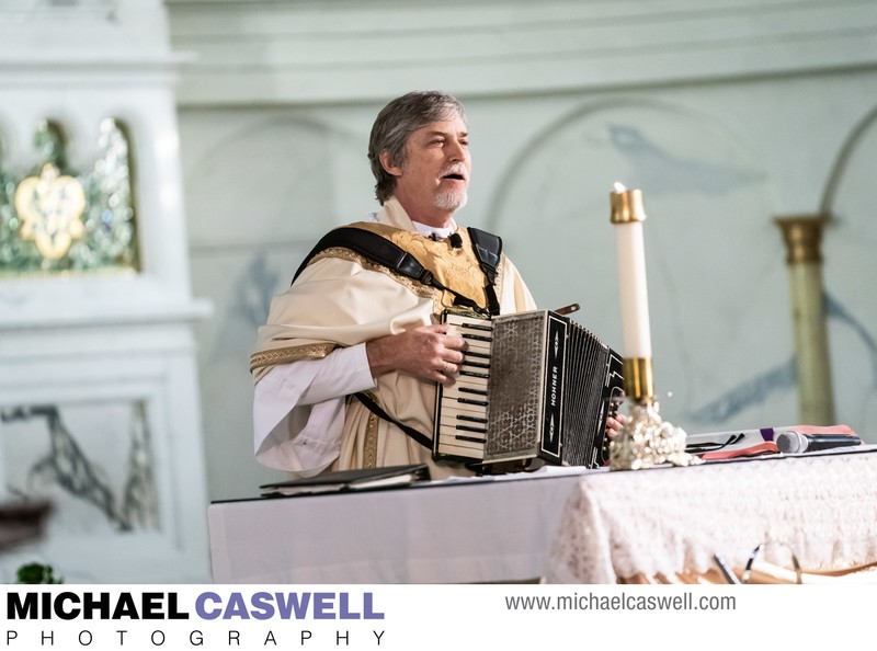 Priest Plays Accordion at St. Joseph Church Wedding