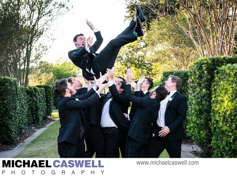 Groomsmen Toss Groom in Air