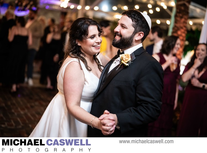 Bride and Groom Dance at Race and Religious Wedding