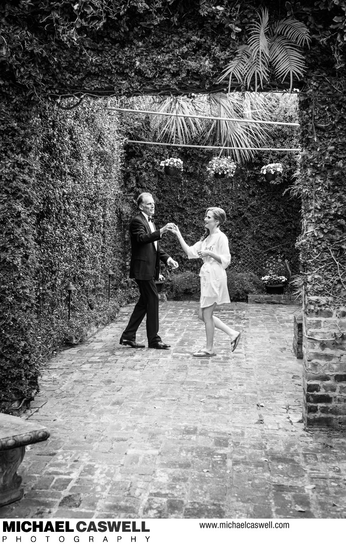 Bride and Father Practice Dancing Before Wedding