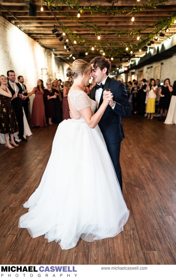 Bride and groom dance at Chicory wedding reception