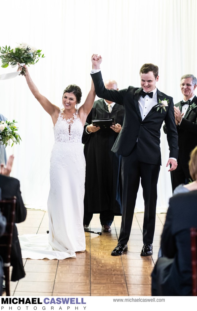 Bride and groom celebrate at Federal Ballroom wedding