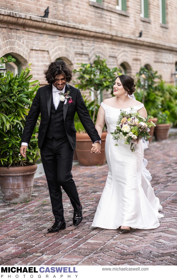 Bride and Groom Walking at Hotel Peter and Paul