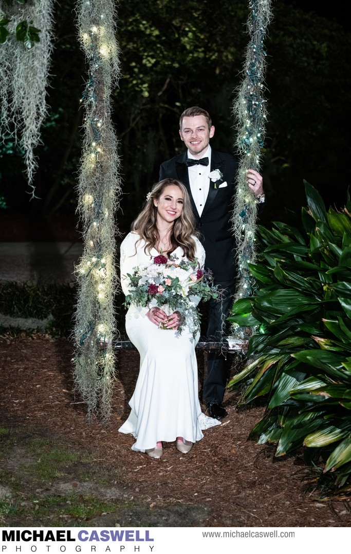 Bride and Groom on Swing at Southern Oaks