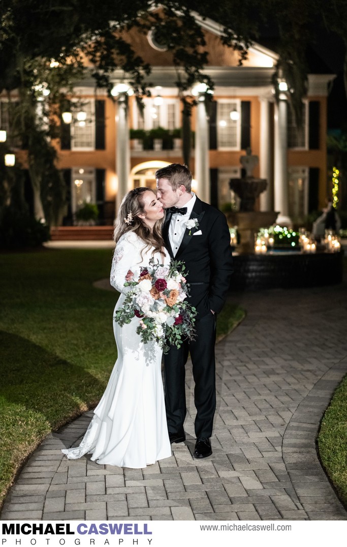 Married couple in front of Southern Oaks