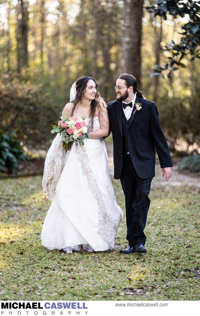 Bride and Groom Walk at Henry Smith House in Picayune