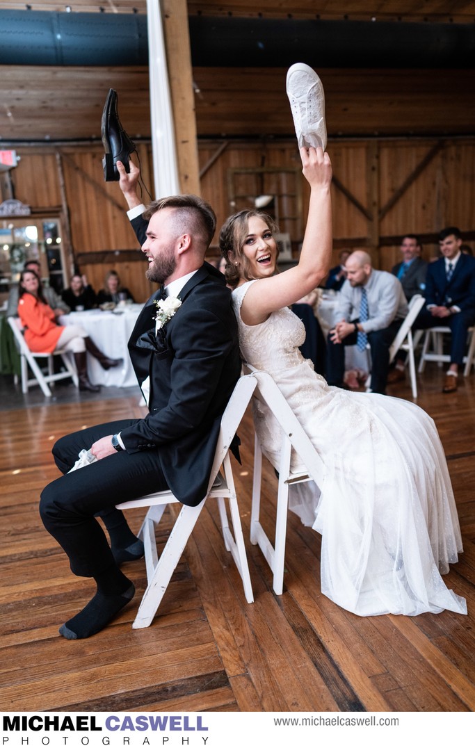 Couple Plays Shoe Game at Wedding