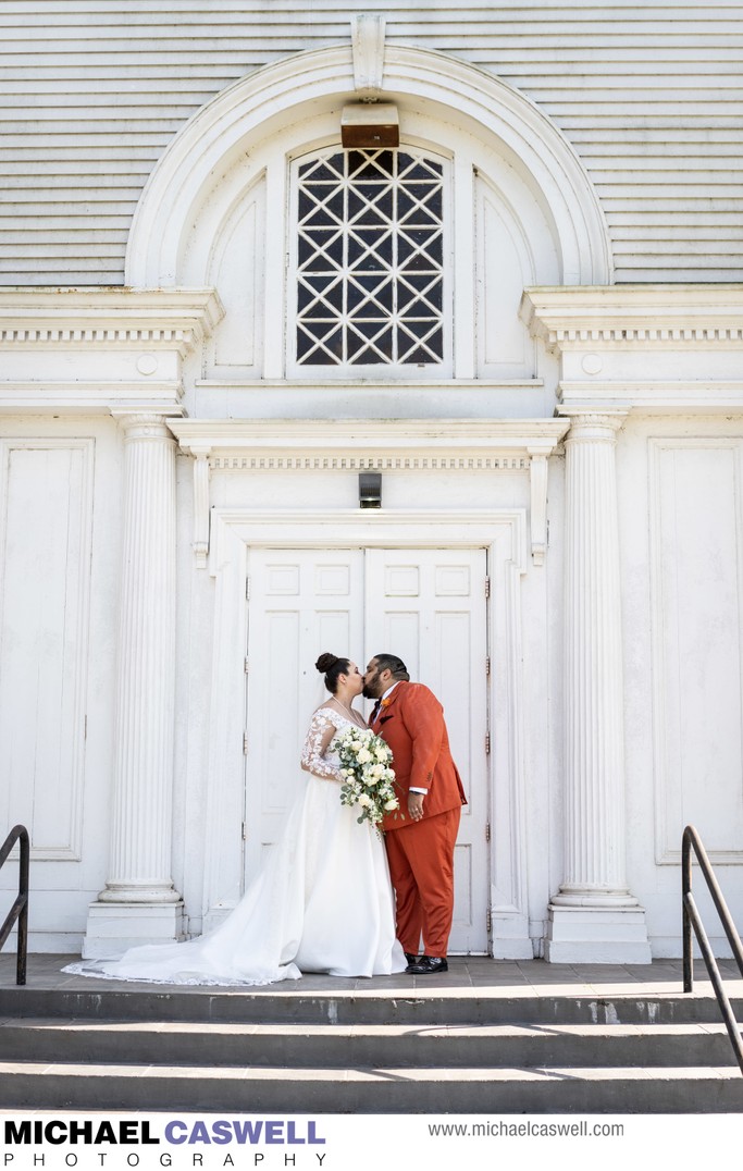 Couple Kisses at St Philip Catholic Church in Vacherie