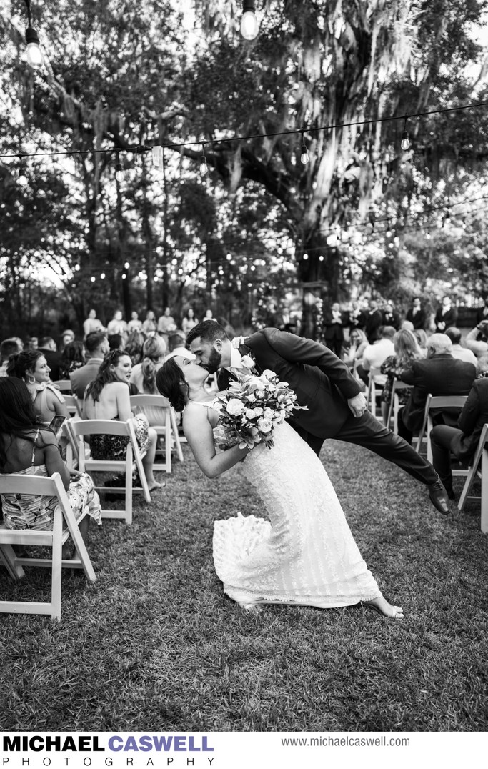 Bride and Groom Kiss at Palmettos Wedding in Slidell