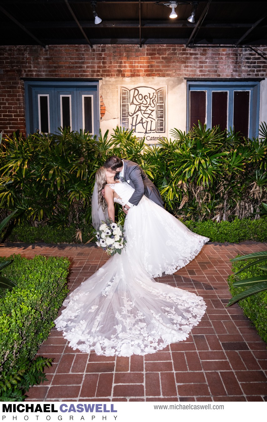 Groom Dips Bride in Front of Rosy's Jazz Hall