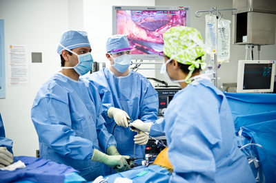 Surgeon performs endoscopic procedure