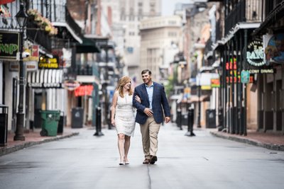 Engaged Couple Walking Down Empty Bourbon Street