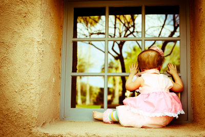 Baby Looking in Window