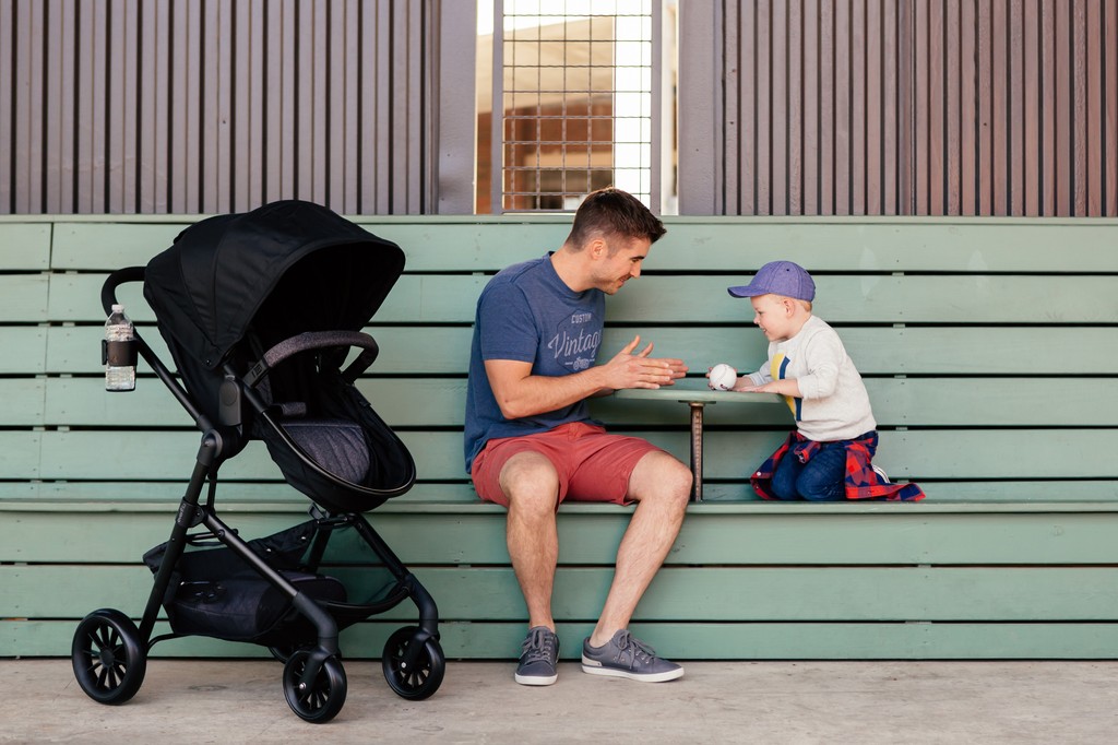 young-family-city-stroll-baby-stroller-commercial-photographer