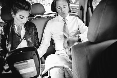 Chicago wedding moment bride and groom in taxi black and white photograph