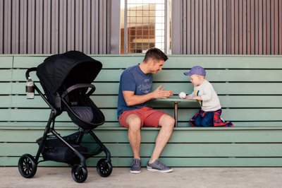young-family-city-stroll-baby-stroller-commercial-photographer