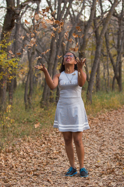 Senior Girl Throwing Leaves Bear Creek Nature Center