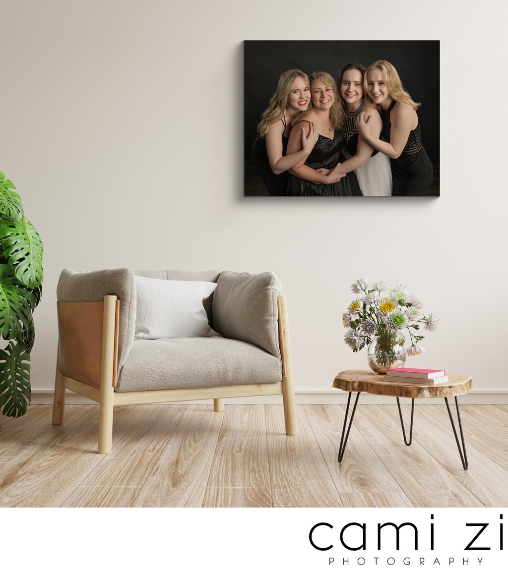 Square frame poster mockup with armchair and green plants on white wall background.