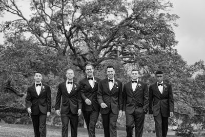 Groom Walking with Groomsmen