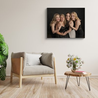 Square frame poster mockup with armchair and green plants on white wall background.