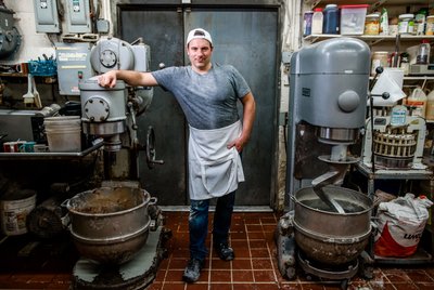 Portrait of a baker in kitchen